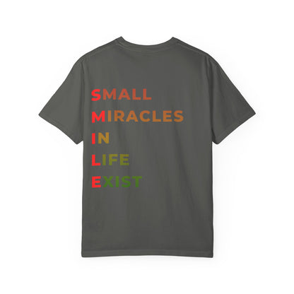 Smile Pocket Tee — “Small Miracles in Life Exist” Inspirational Graphic T-Shirt