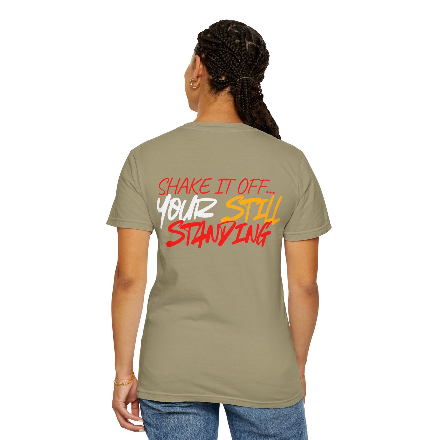 Woman wearing a khaki t-shirt with text on the back, standing against a white background