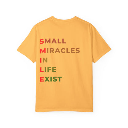 Smile Pocket Tee — “Small Miracles in Life Exist” Inspirational Graphic T-Shirt