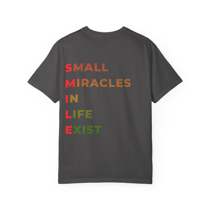 Smile Pocket Tee — “Small Miracles in Life Exist” Inspirational Graphic T-Shirt
