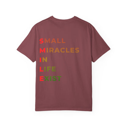 Smile Pocket Tee — “Small Miracles in Life Exist” Inspirational Graphic T-Shirt