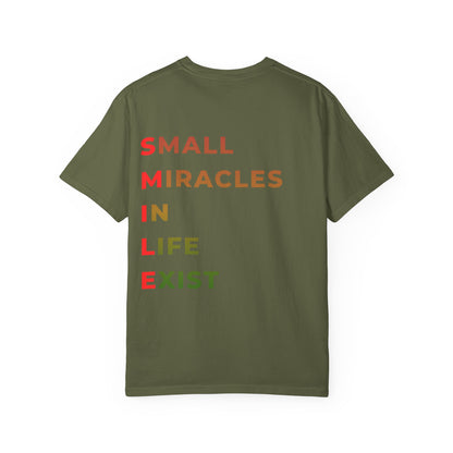 Smile Pocket Tee — “Small Miracles in Life Exist” Inspirational Graphic T-Shirt